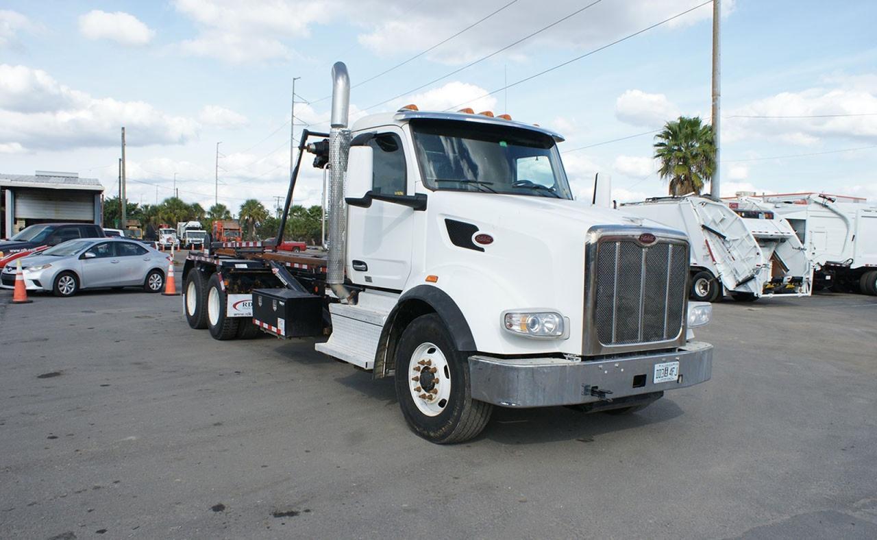 2023 Peterbilt 567 60,000 lb Pac Mac Roll Off Truck
