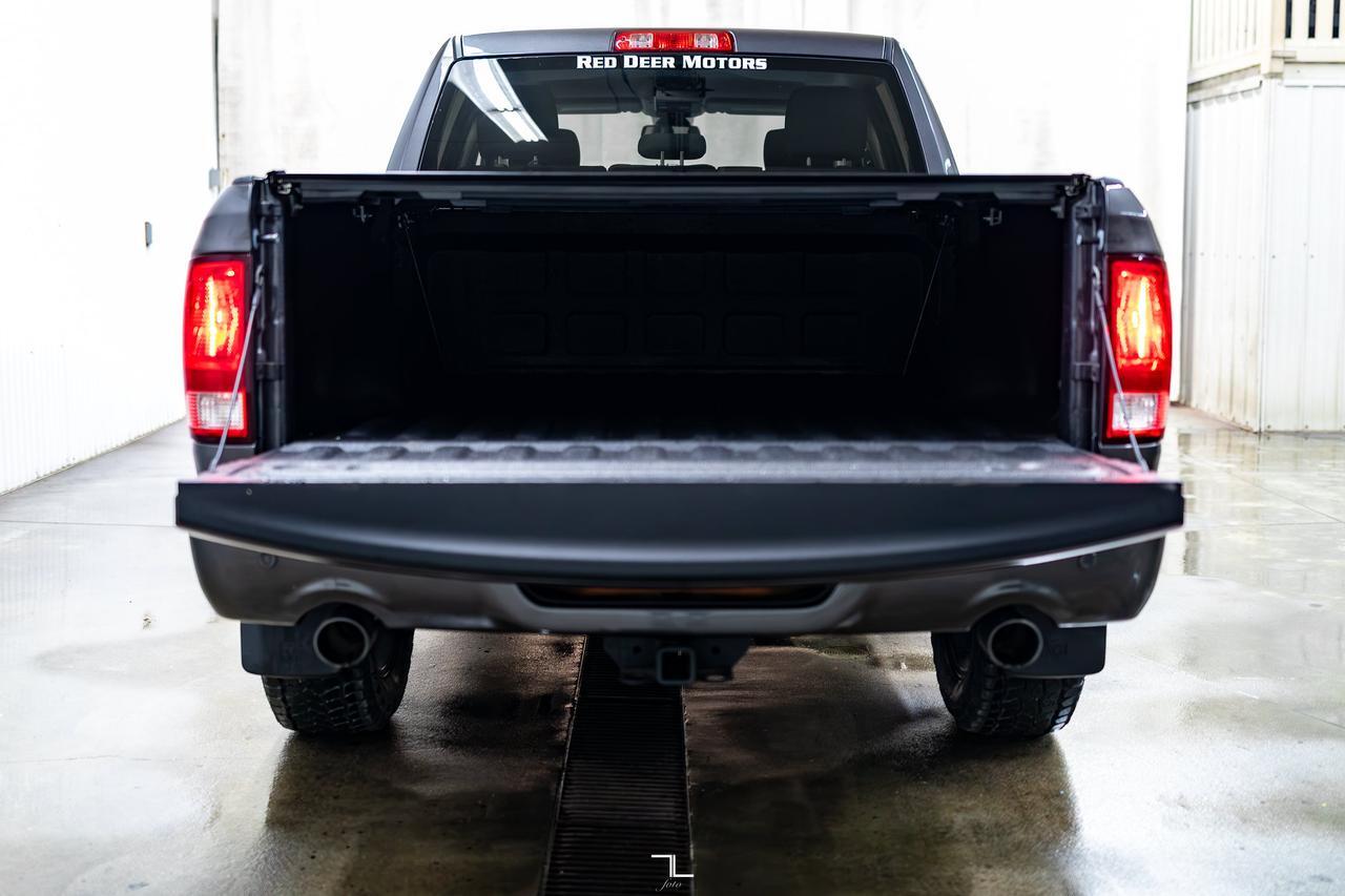 2023 Ram 1500 Classic 4x4 Crew Cab Express Night Edition PSeat BCam Red Deer AB