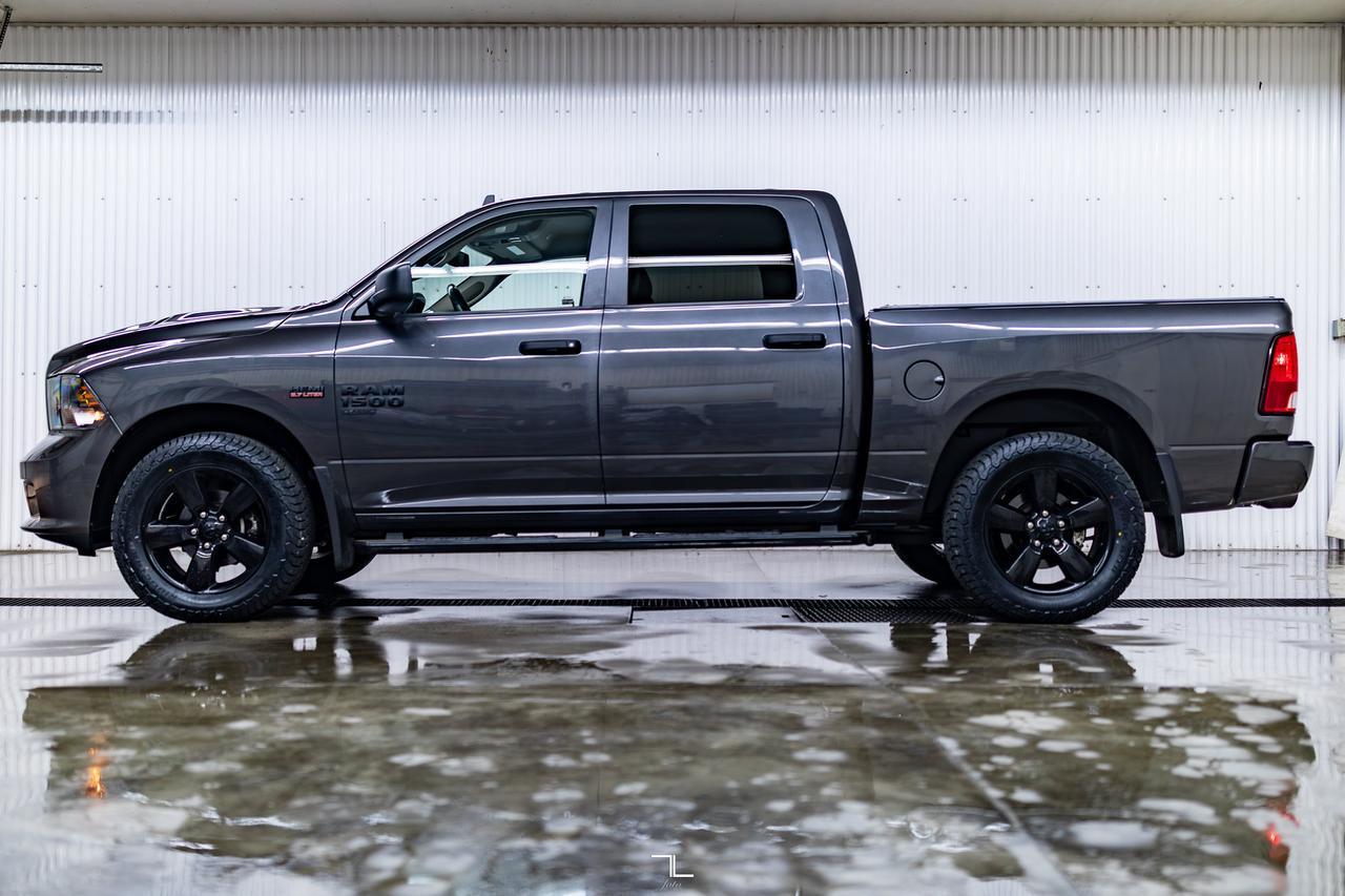 2023 Ram 1500 Classic 4x4 Crew Cab Express Night Edition PSeat BCam Red Deer AB