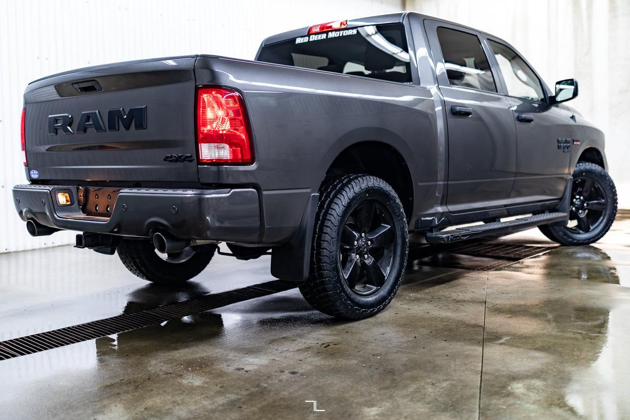2023 Ram 1500 Classic 4x4 Crew Cab Express Night Edition PSeat BCam Red Deer AB