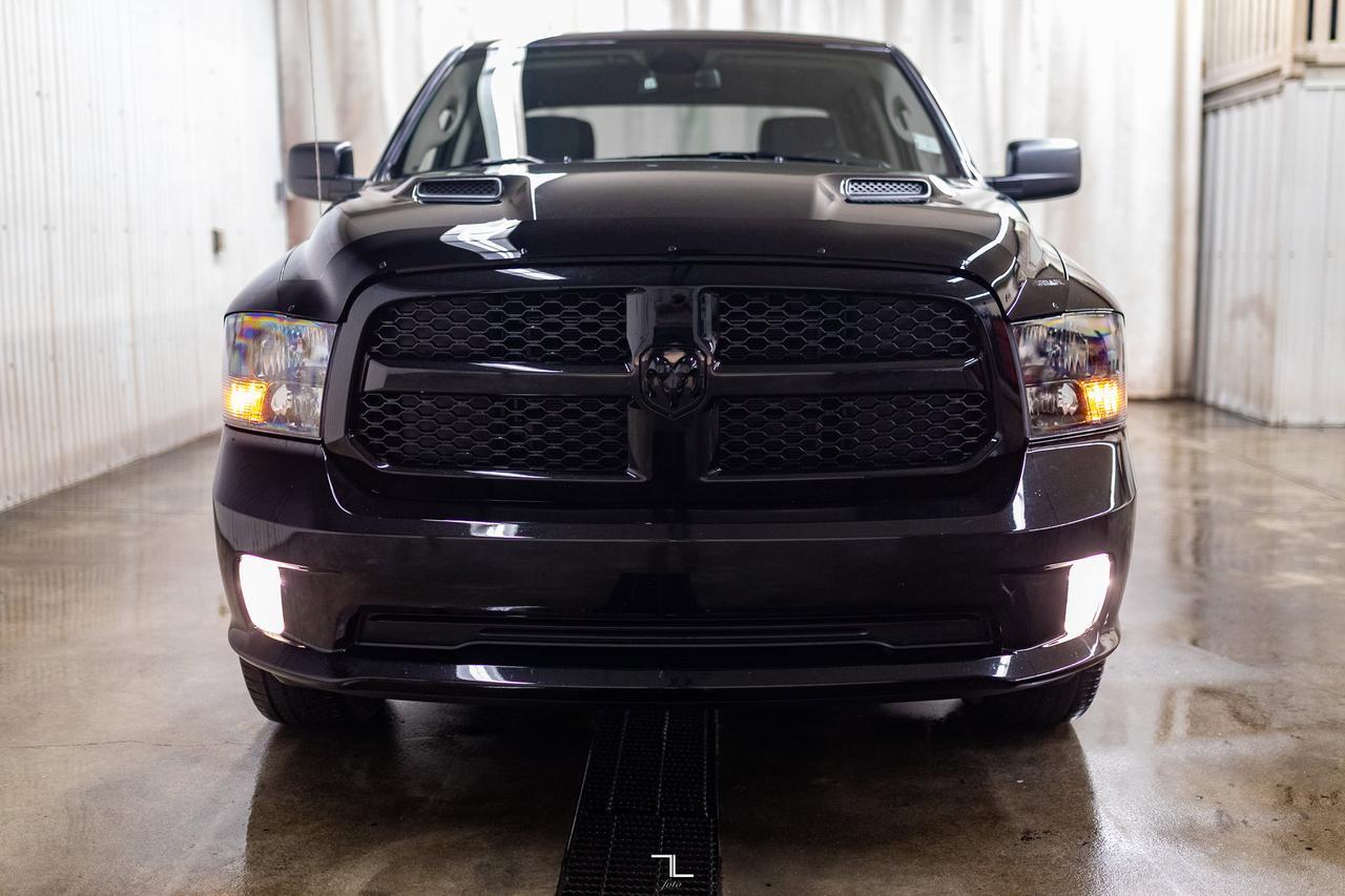 2023 Ram 1500 Classic 4x4 Crew Cab Express PSeat BCam Red Deer AB