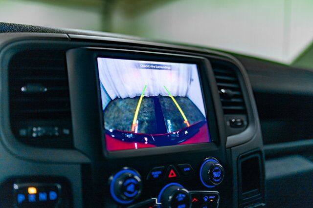 2023 Ram 1500 Classic 4x4 Crew Cab Express PSeat BCam Red Deer AB