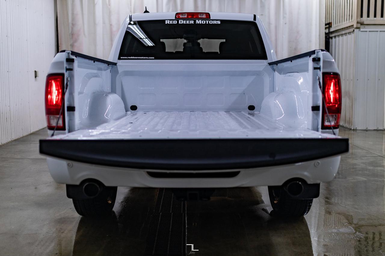 2023 Ram 1500 Classic 4x4 Crew Cab Express PSeat BCam Red Deer AB