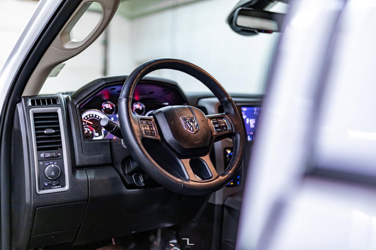 2023 Ram 1500 Classic 4x4 Crew Cab Express PSeat BCam Red Deer AB