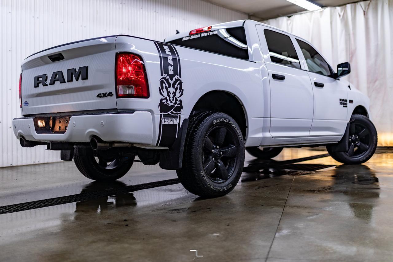 2023 Ram 1500 Classic 4x4 Crew Cab Express PSeat BCam Red Deer AB