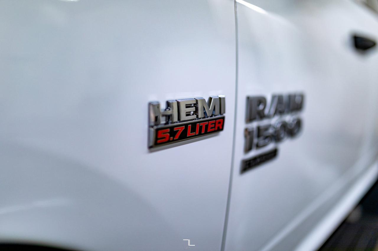 2023 Ram 1500 Classic 4x4 Crew Cab Express PSeat BCam Red Deer AB