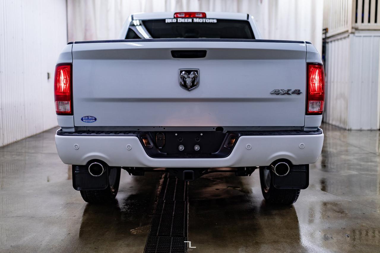 2023 Ram 1500 Classic 4x4 Crew Cab Express PSeat BCam Red Deer AB