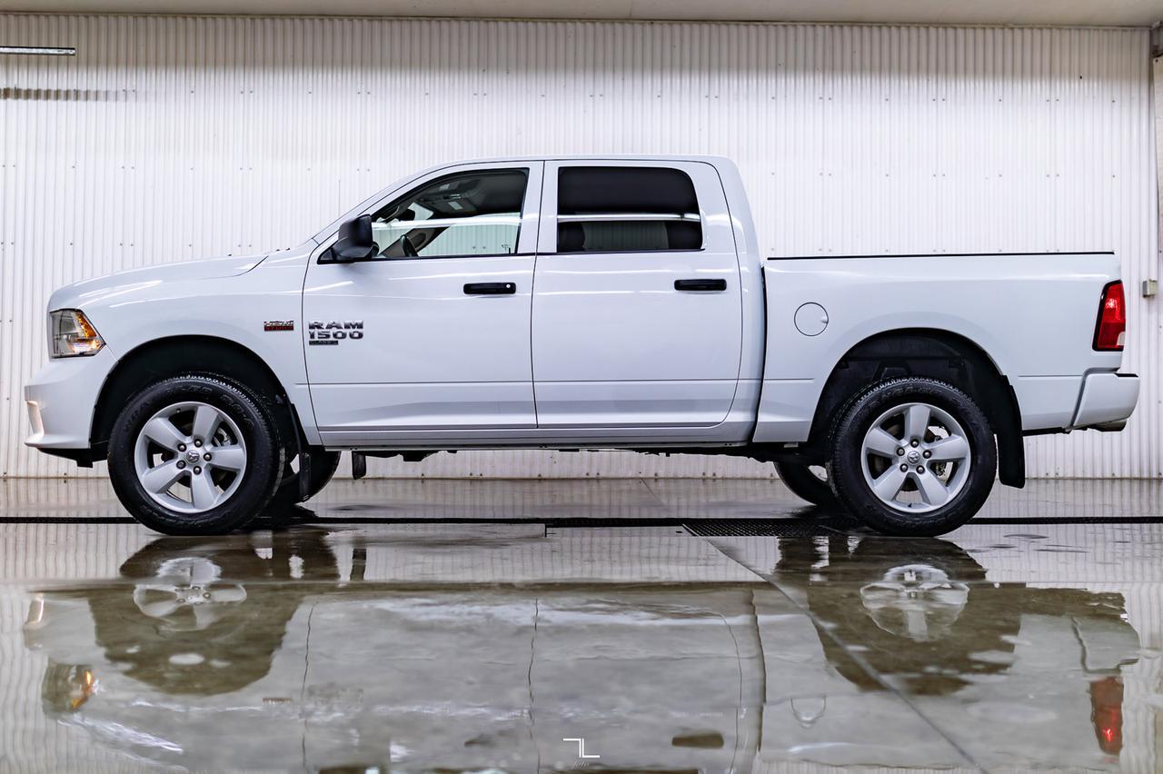 2023 Ram 1500 Classic 4x4 Crew Cab Express PSeat BCam Red Deer AB