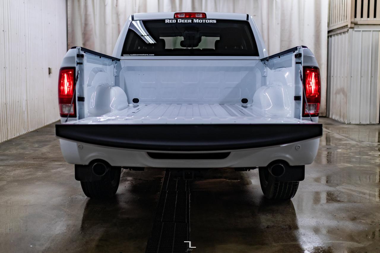 2023 Ram 1500 Classic 4x4 Crew Cab Express PSeat BCam Red Deer AB