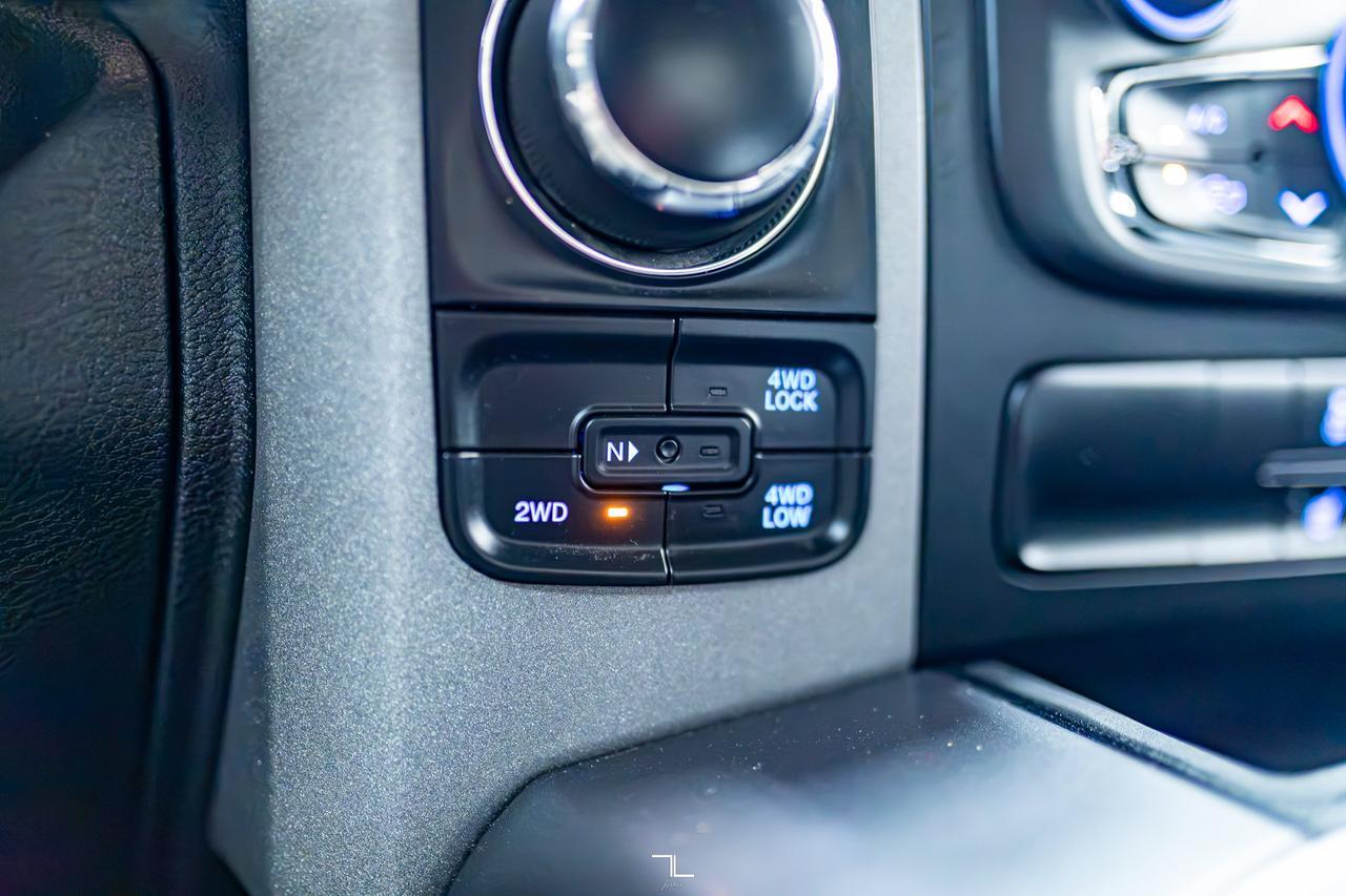 2023 Ram 1500 Classic 4x4 Crew Cab Express PSeat BCam Red Deer AB