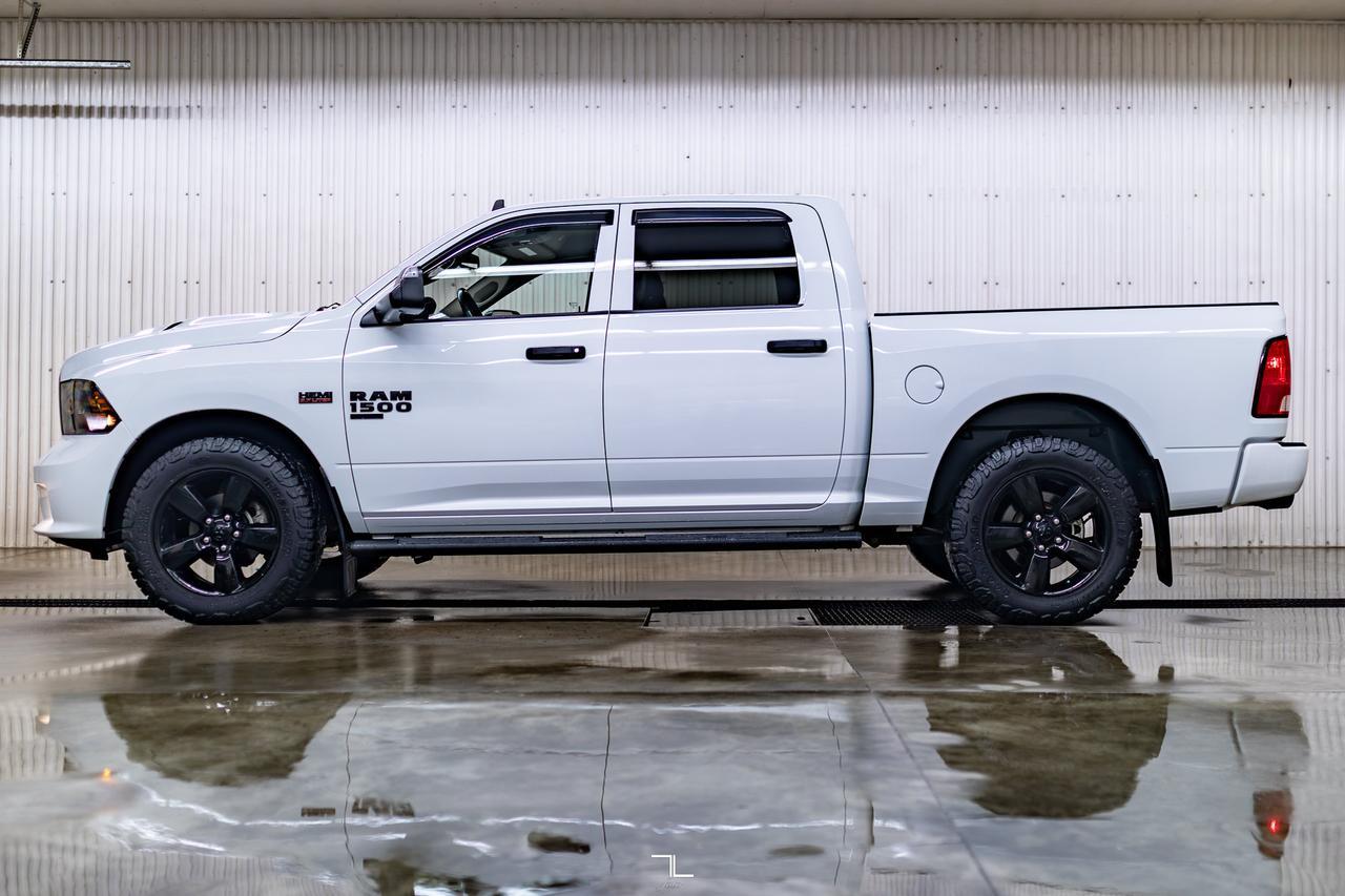 2023 Ram 1500 Classic 4x4 Crew Cab Express PSeat BCam Red Deer AB