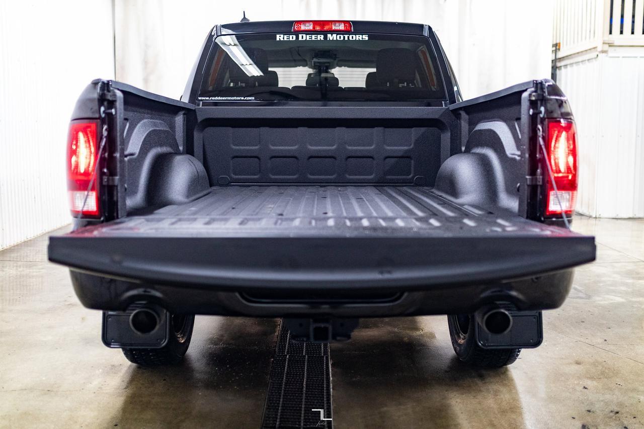 2023 Ram 1500 Classic 4x4 Crew Cab SLT Nav BCam Red Deer AB