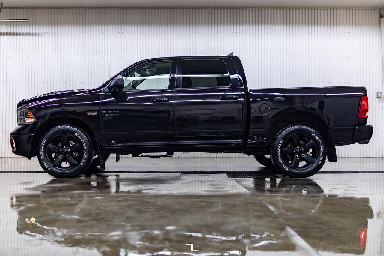 2023 Ram 1500 Classic 4x4 Crew Cab SLT Nav BCam Red Deer AB