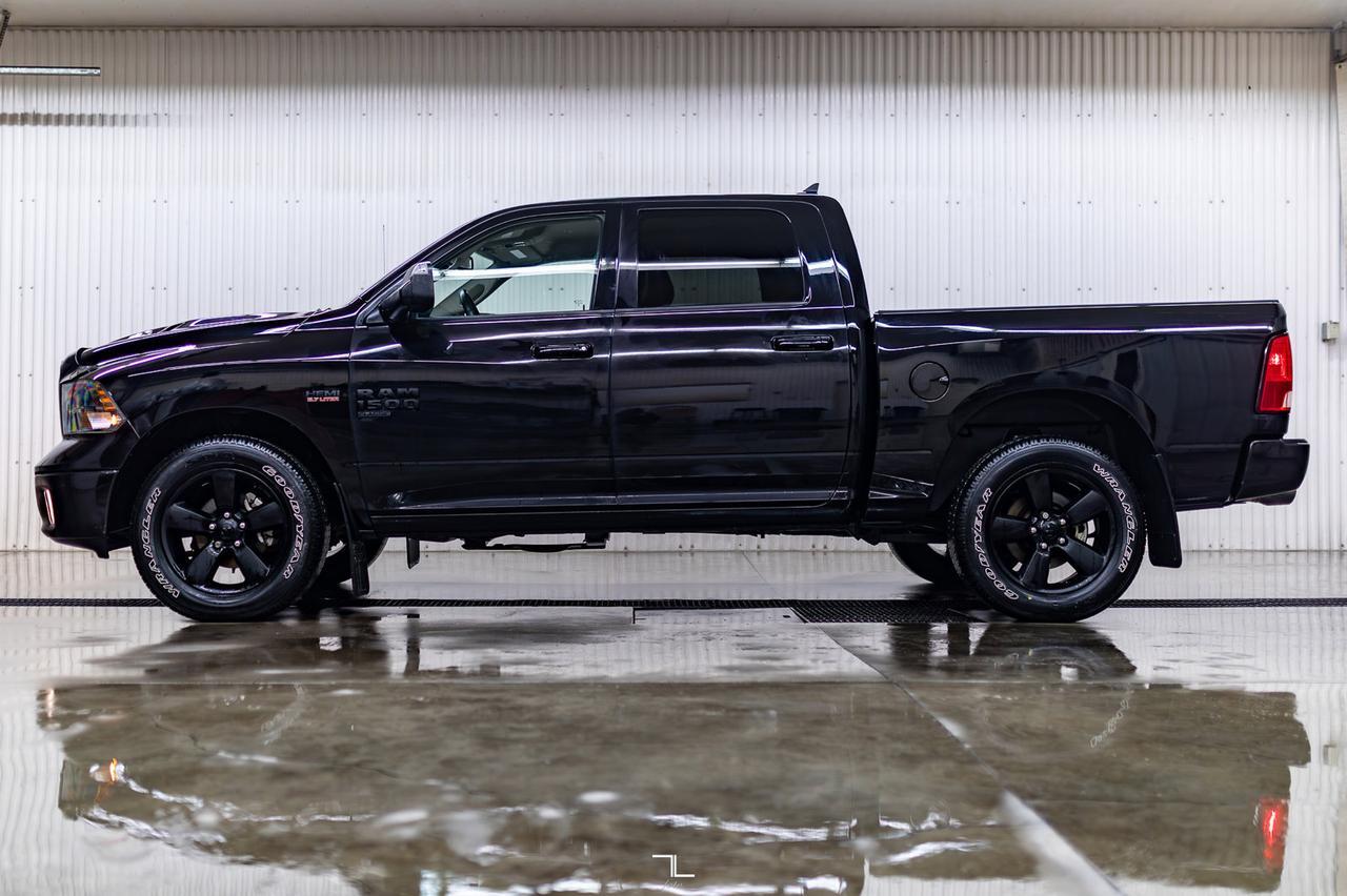 2023 Ram 1500 Classic 4x4 Crew Cab SLT Nav BCam Red Deer AB