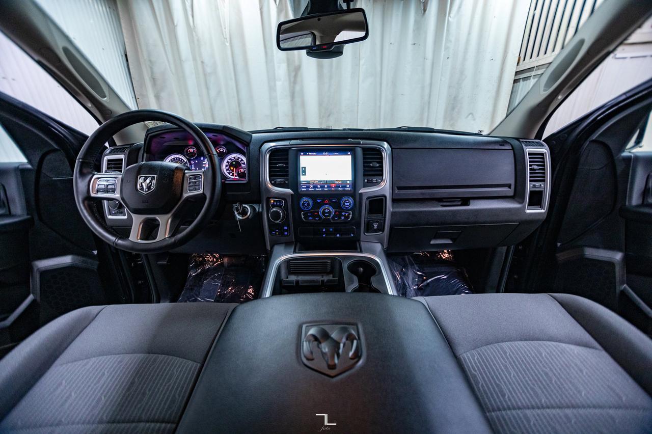 2023 Ram 1500 Classic 4x4 Crew Cab SLT Nav BCam Red Deer AB