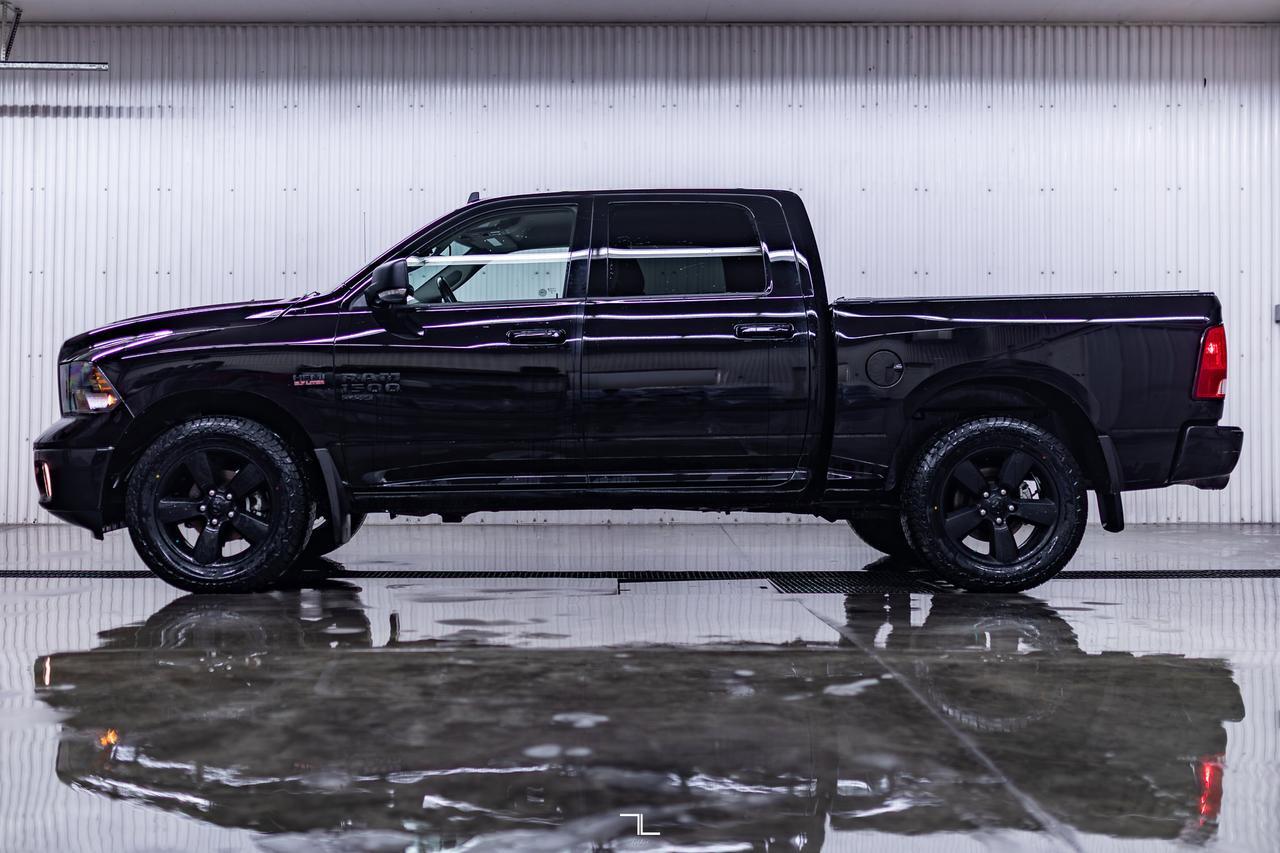 2023 Ram 1500 Classic 4x4 Crew Cab SLT Nav BCam Red Deer AB