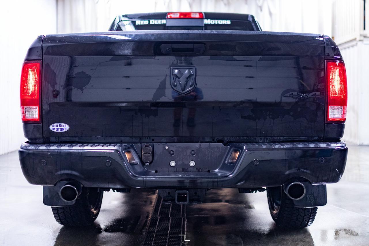 2023 Ram 1500 Classic 4x4 Crew Cab SLT Nav BCam Red Deer AB