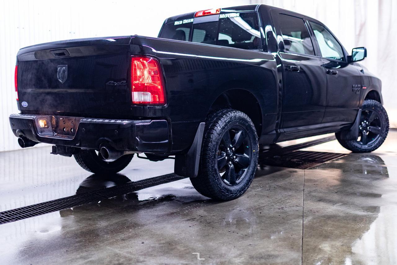 2023 Ram 1500 Classic 4x4 Crew Cab SLT Nav BCam Red Deer AB