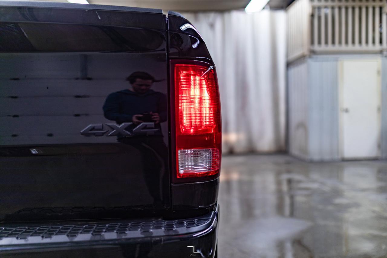 2023 Ram 1500 Classic 4x4 Crew Cab SLT Nav Roof BCam Red Deer AB