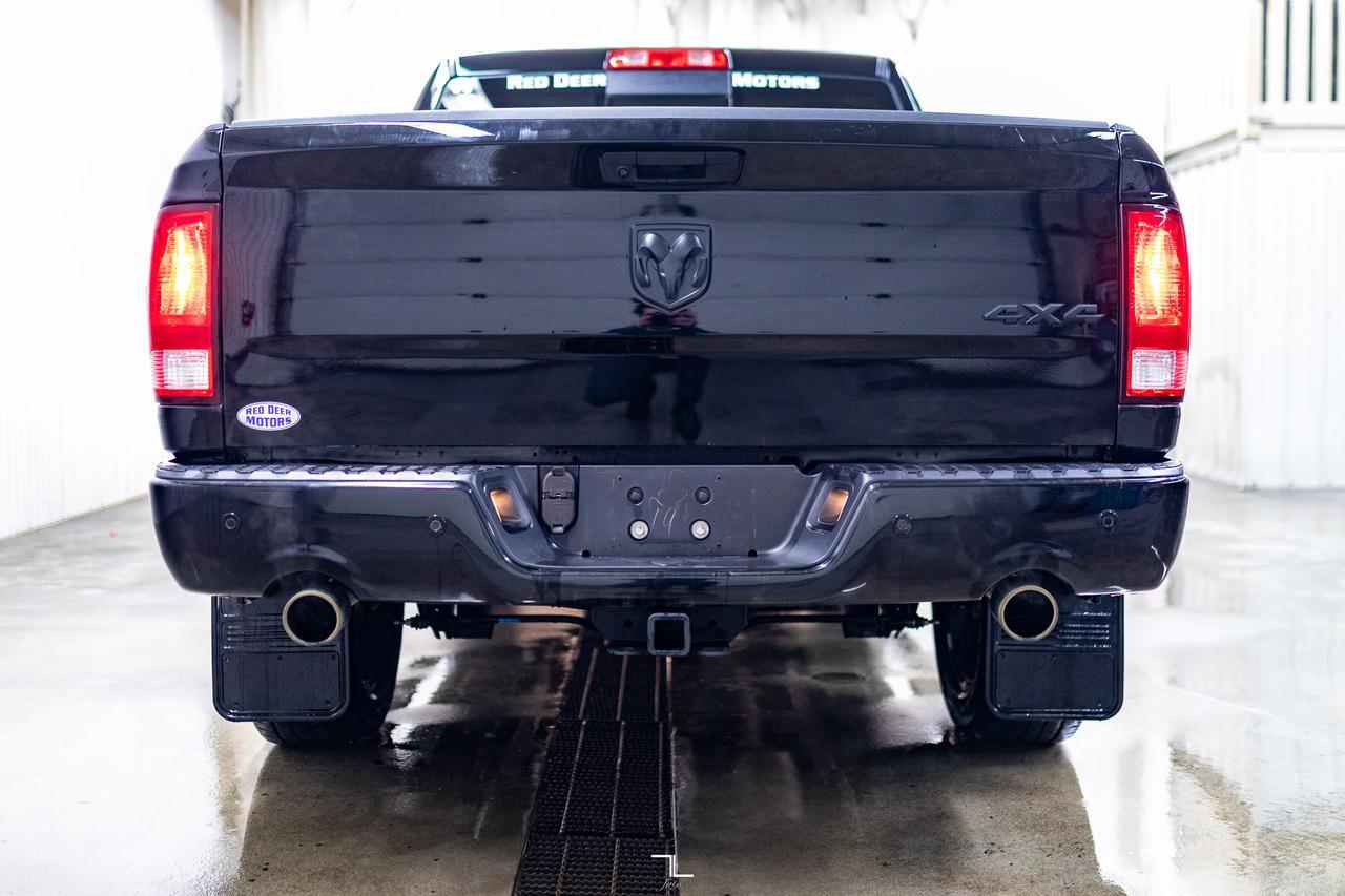 2023 Ram 1500 Classic 4x4 Crew Cab SLT Nav Roof BCam Red Deer AB