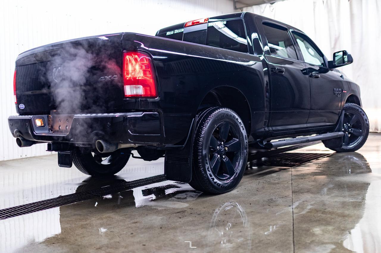 2023 Ram 1500 Classic 4x4 Crew Cab SLT Nav Roof BCam Red Deer AB