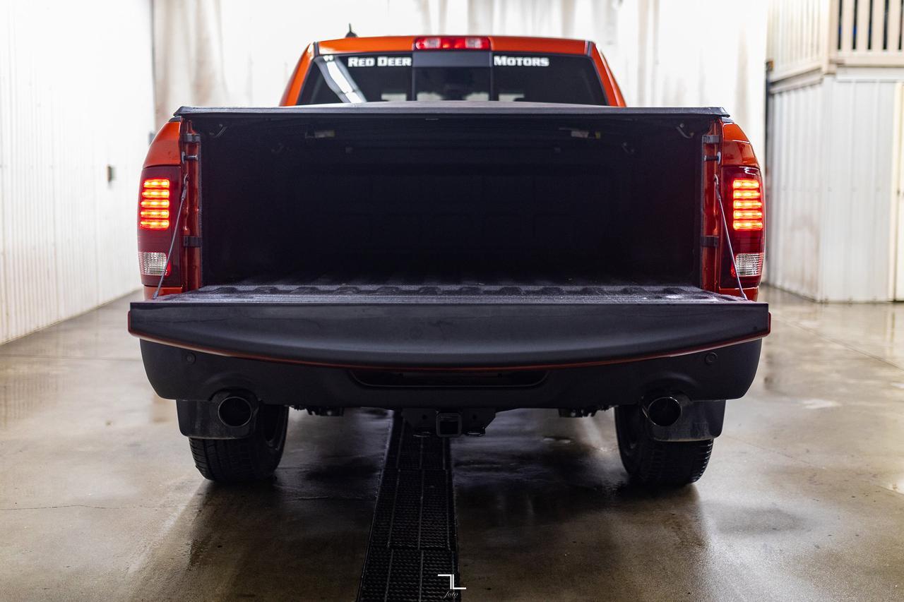 2023 Ram 1500 Classic 4x4 Crew Cab Warlock Nav BCam Red Deer AB