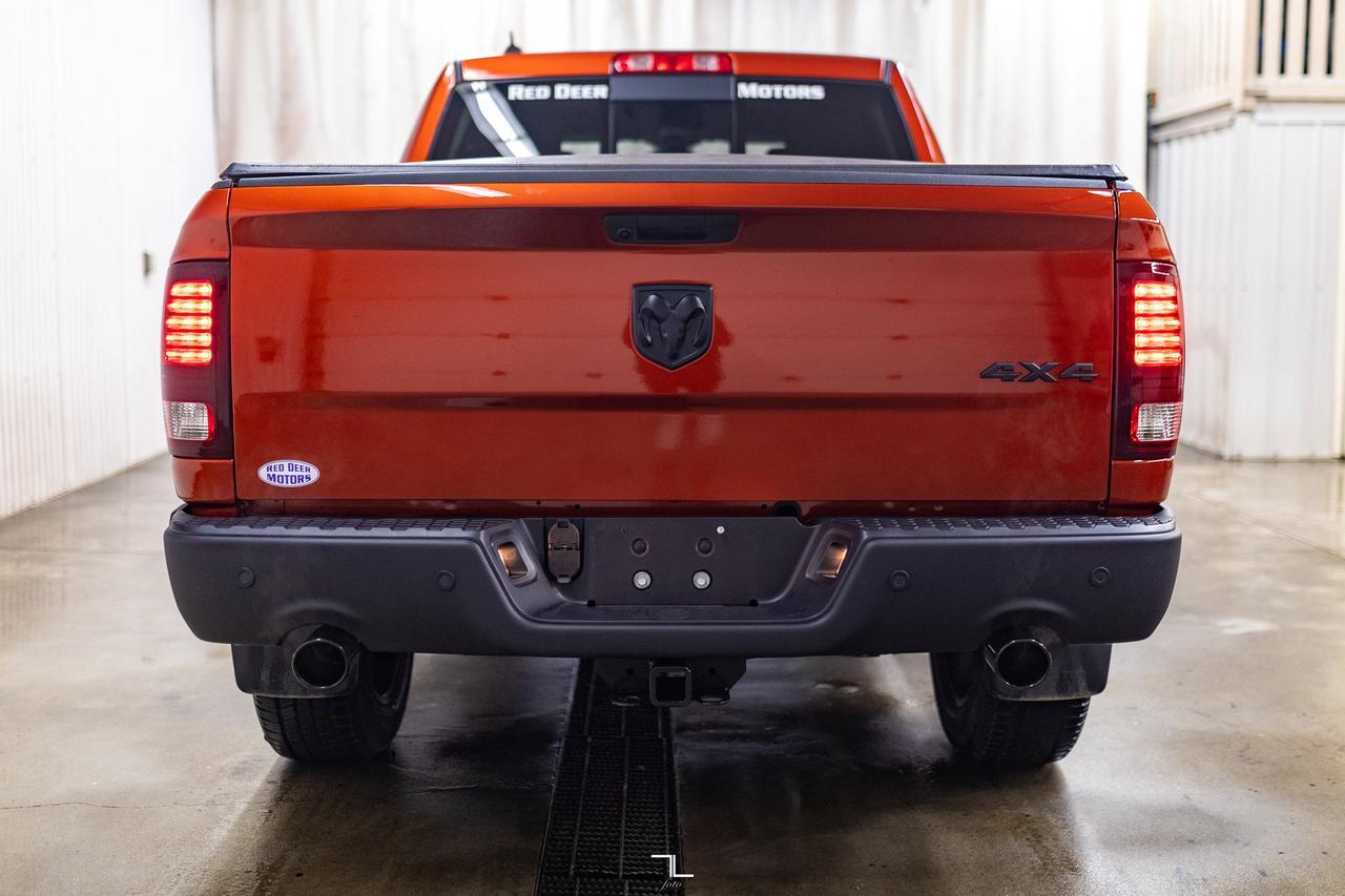 2023 Ram 1500 Classic 4x4 Crew Cab Warlock Nav BCam Red Deer AB