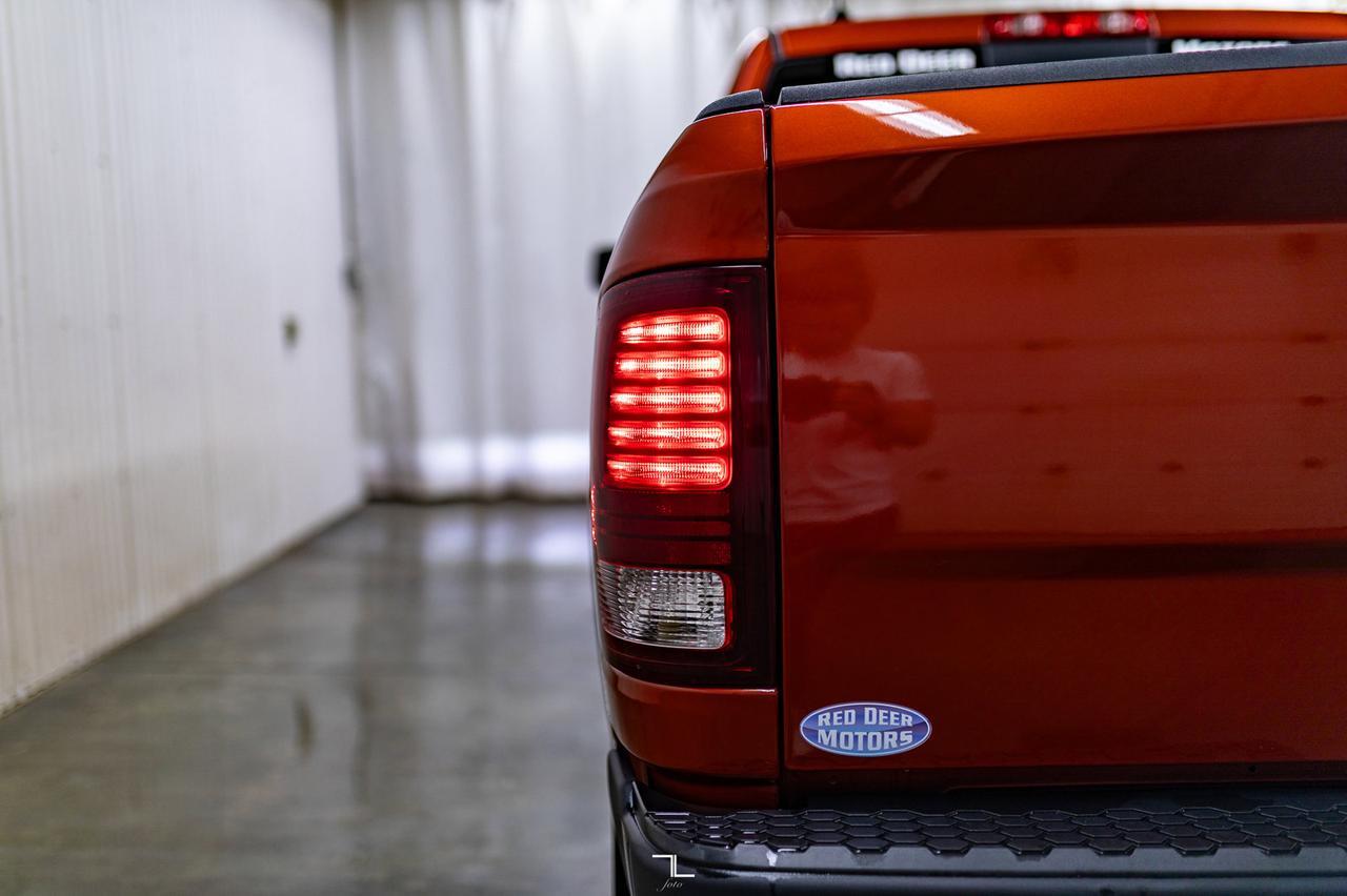 2023 Ram 1500 Classic 4x4 Crew Cab Warlock Nav BCam Red Deer AB