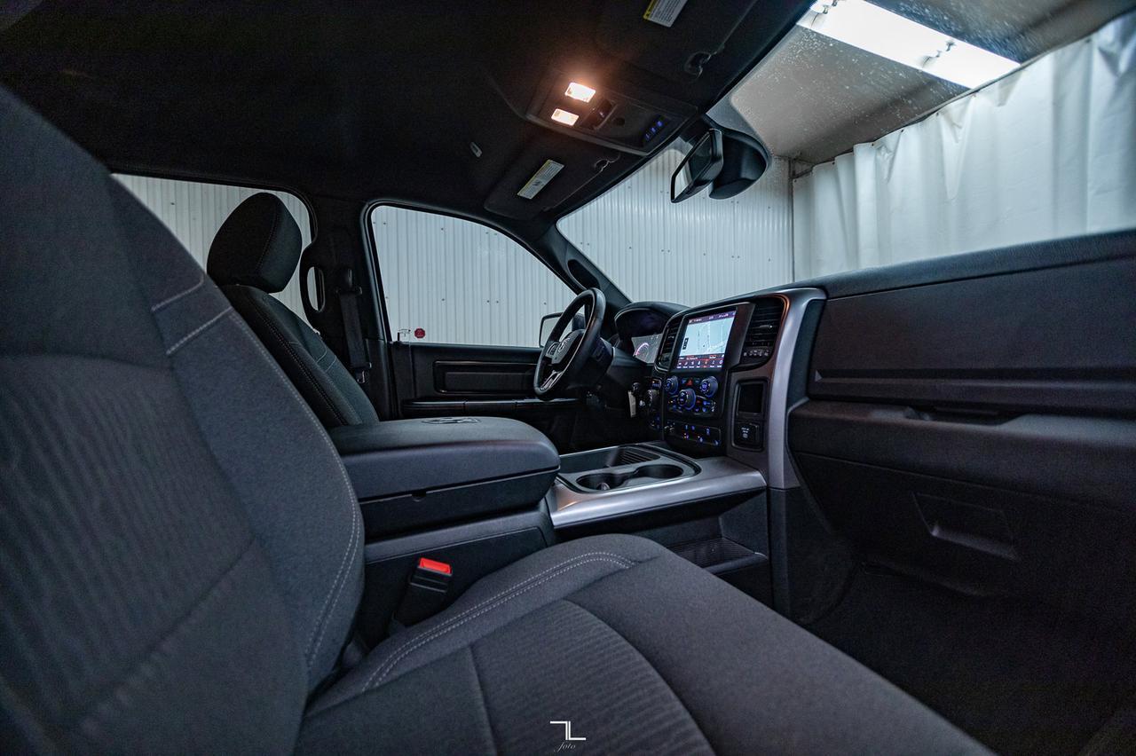 2023 Ram 1500 Classic 4x4 Crew Cab Warlock Nav BCam Red Deer AB