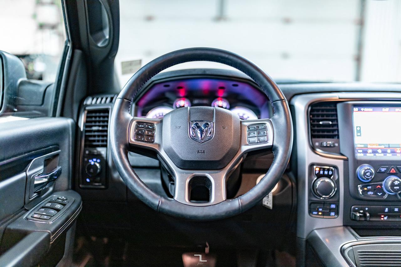 2023 Ram 1500 Classic 4x4 Crew Cab Warlock Nav BCam Red Deer AB