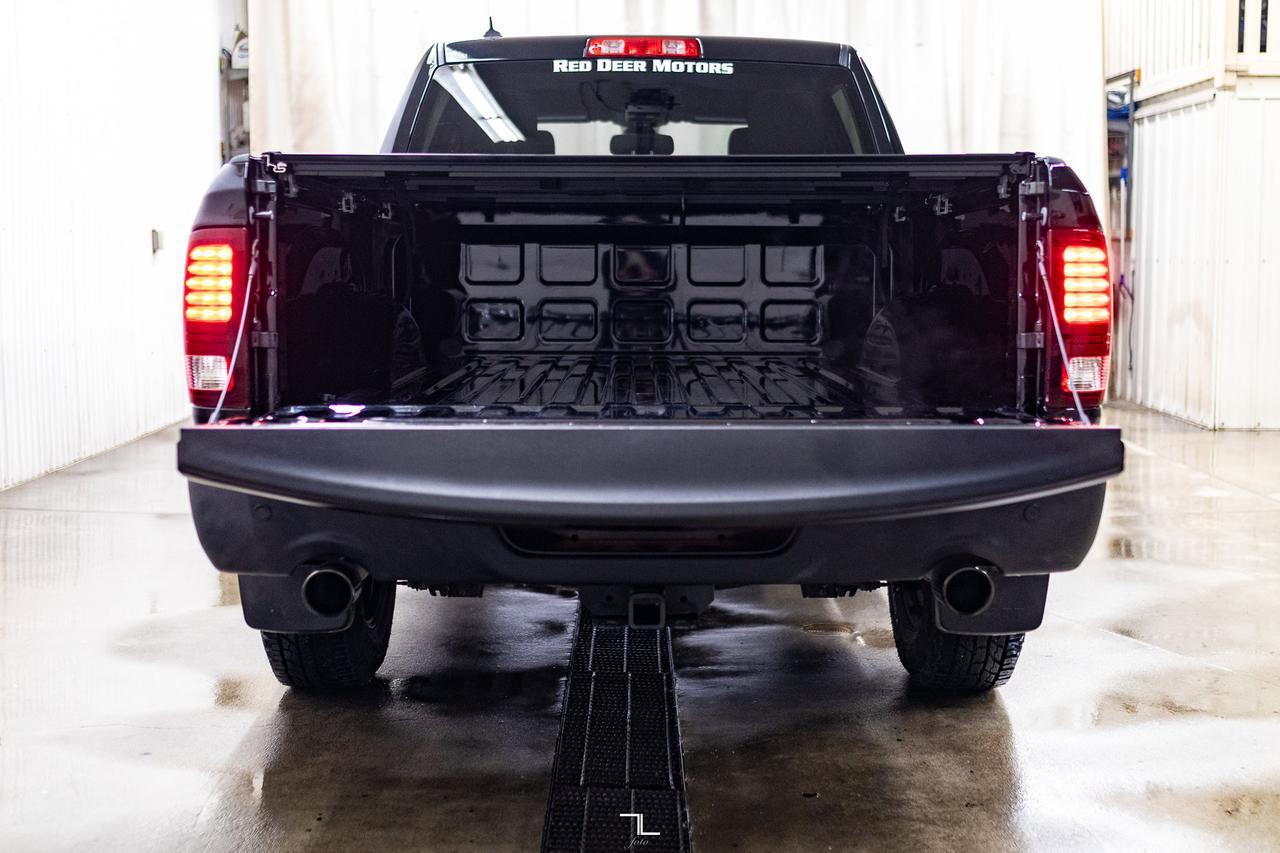 2023 Ram 1500 Classic 4x4 Crew Cab Warlock PSeat BCam Red Deer AB