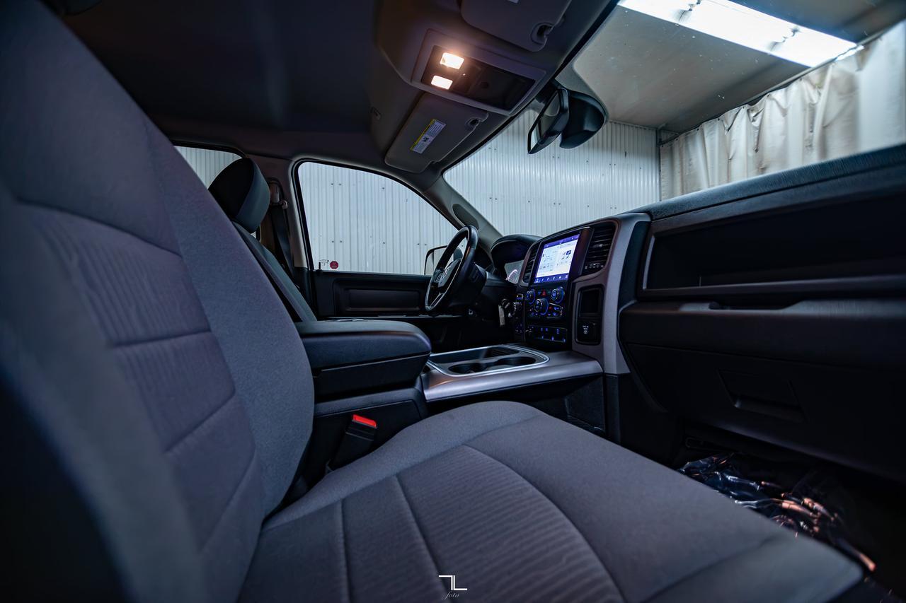 2023 Ram 1500 Classic 4x4 Quad Cab Express PSeat BCam Red Deer AB