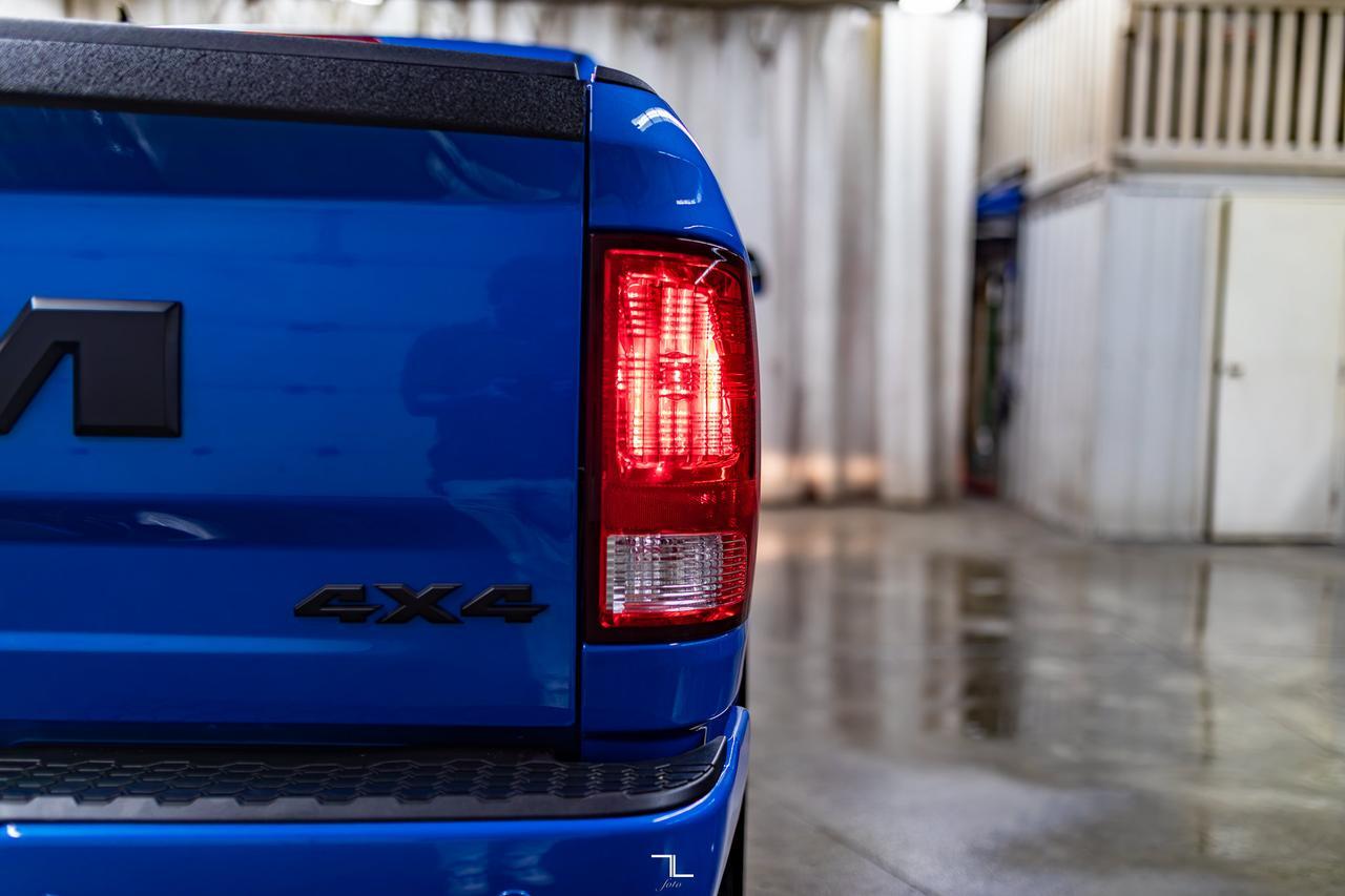 2023 Ram 1500 Classic 4x4 Quad Cab Express PSeat BCam Red Deer AB