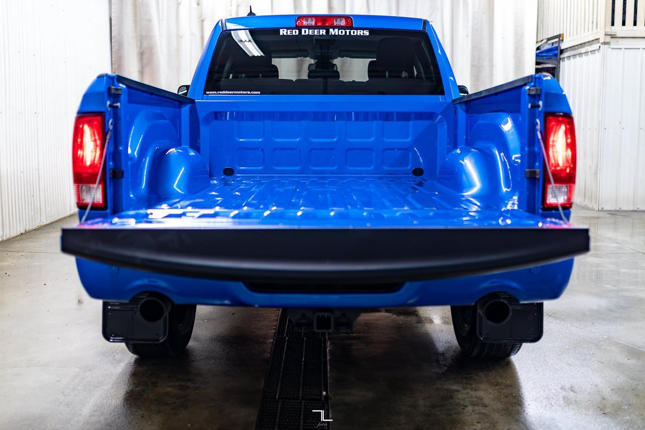 2023 Ram 1500 Classic 4x4 Quad Cab Express PSeat BCam Red Deer AB
