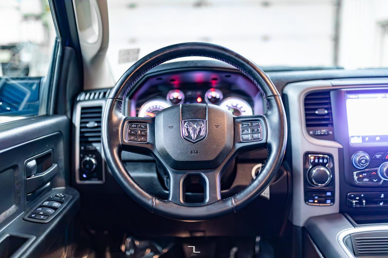 2023 Ram 1500 Classic 4x4 Quad Cab Express PSeat BCam Red Deer AB