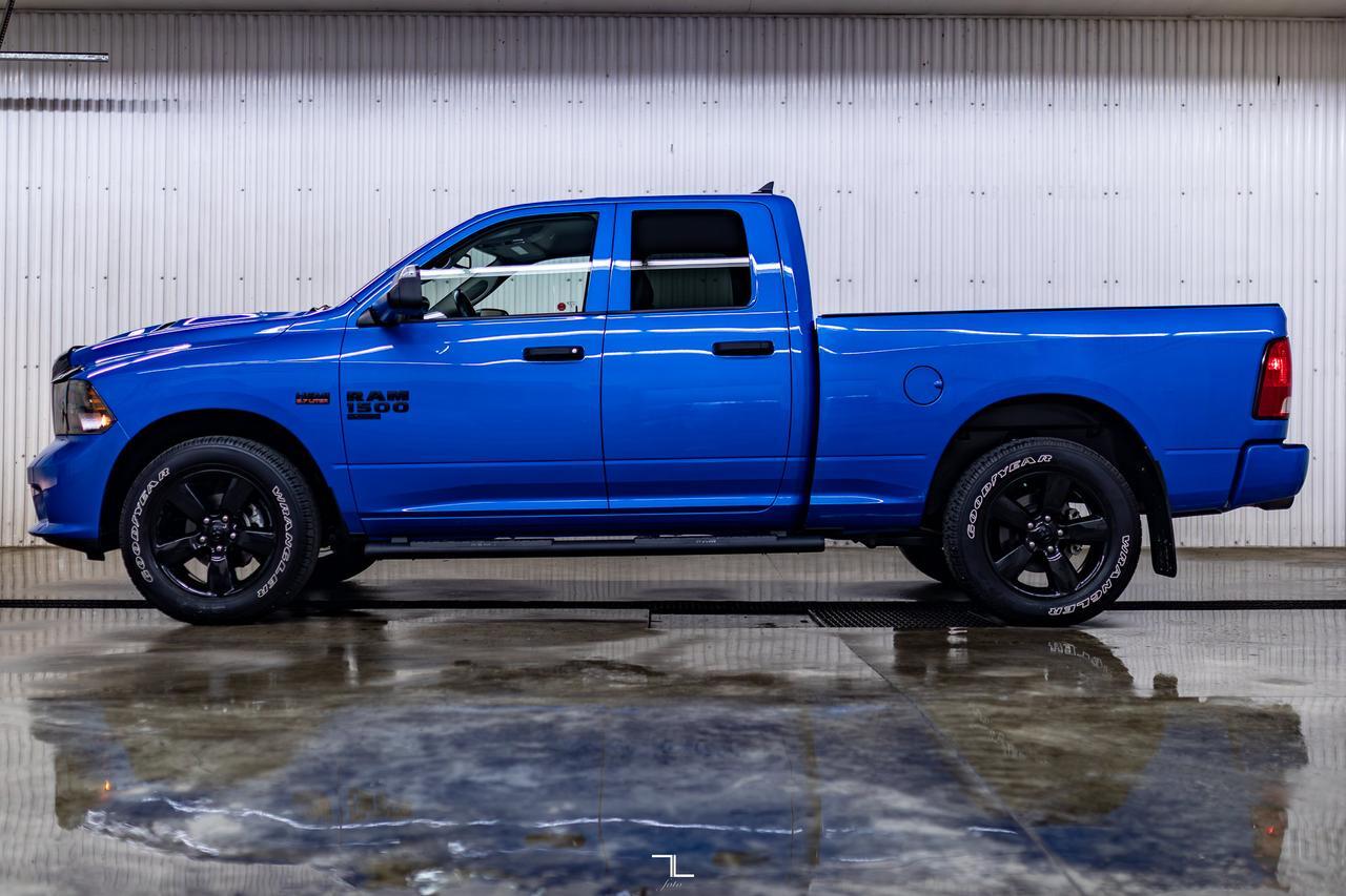 2023 Ram 1500 Classic 4x4 Quad Cab Express PSeat BCam Red Deer AB