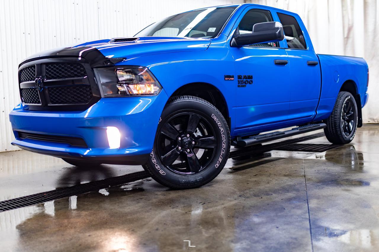 2023 Ram 1500 Classic 4x4 Quad Cab Express PSeat BCam Red Deer AB