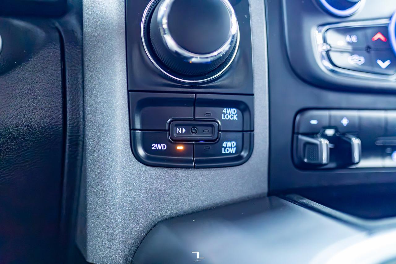 2023 Ram 1500 Classic 4x4 Quad Cab Express PSeat BCam Red Deer AB