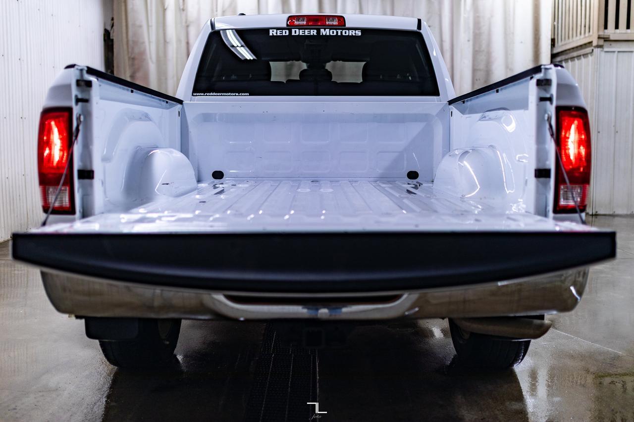 2023 Ram 1500 Classic 4x4 Quad Cab Tradesman PSeat BCam 6.5" Box Red Deer AB