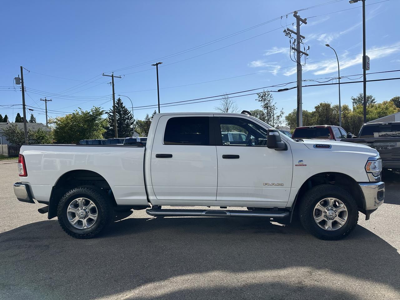 2023 Ram 2500 Big Horn Crew Cab 4x4 | Cummins Diesel | Premium Cloth Heated Seats | Remote Start | NAV | Side Step Redwater AB