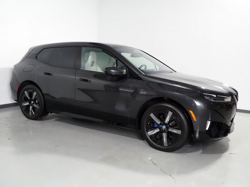 2024 BMW iX xDrive50 AWD *SPORT PKG, DRIVING ASSIST PRO, HEADS-UP DISPLAY, NAVIGATION, ADAPTIVE CRUISE, SAFETY ALERTS, 360 CAMERAS, PANO ECLIPSING MOONROOF, CLIMATE SEATS, HEATED STEERING, HARMAN/KARDON, WIRELESS CHARGING