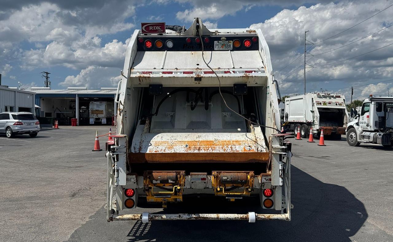 2024 Battle Motors LET2 25 yd Pac Tech Rear Loader Garbage Truck Tampa FL