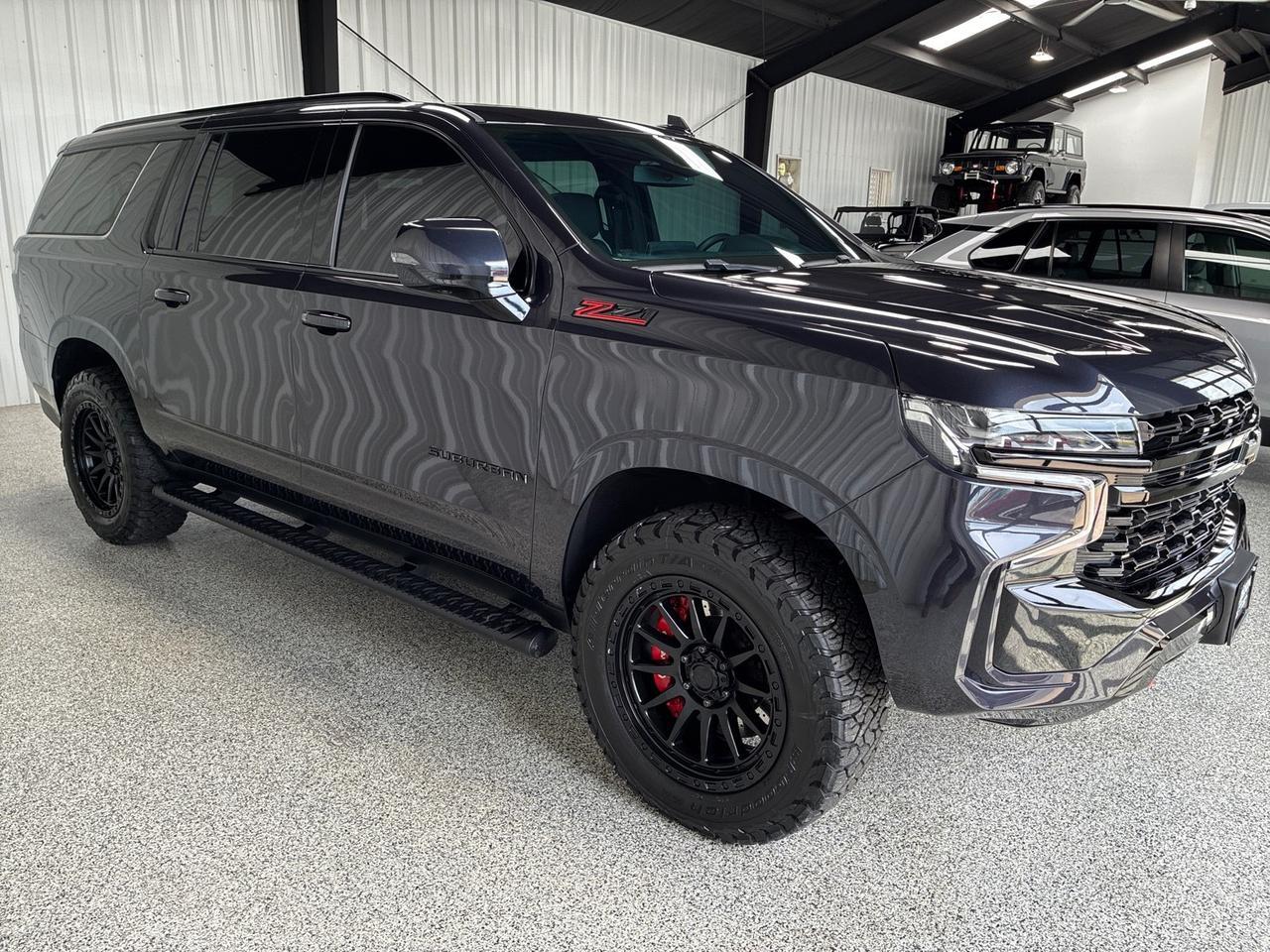2024 Chevrolet Suburban Z71, Luxury Pkg, Pano Roof, Buckets, Blacked Out Chrome, Brembo Brakes, American Outlaw Wheels Houston TX