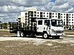 2024 Isuzu NPR-HD Crew cab 14 + 5 Steel Landscape Flatbed Dove Tail.