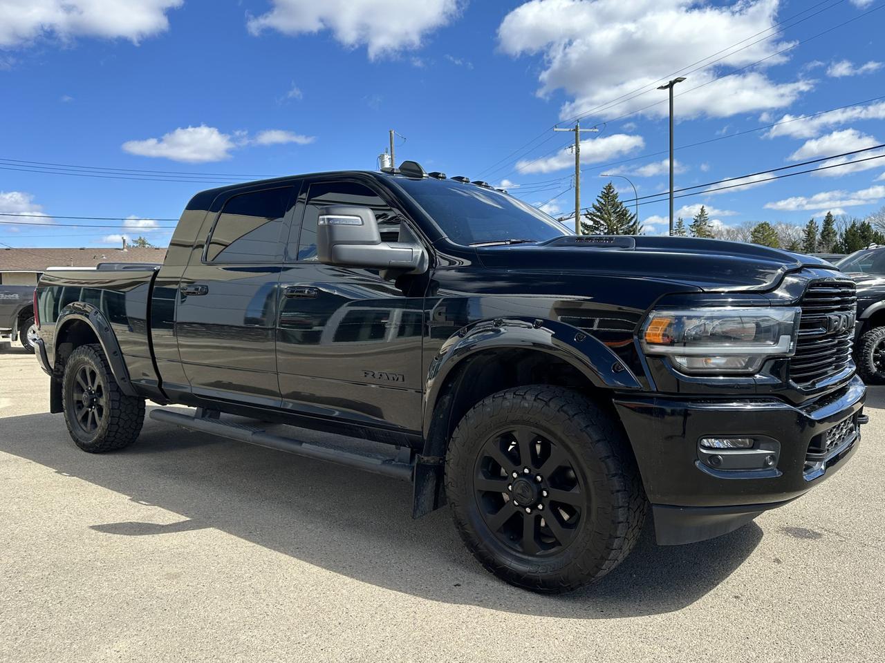 2024 Ram 3500 Laramie Mega Cab | Cummins HO Diesel |  Night Edition | 12IN Touchscreen | NAV | Harman Kardon Sound Redwater AB