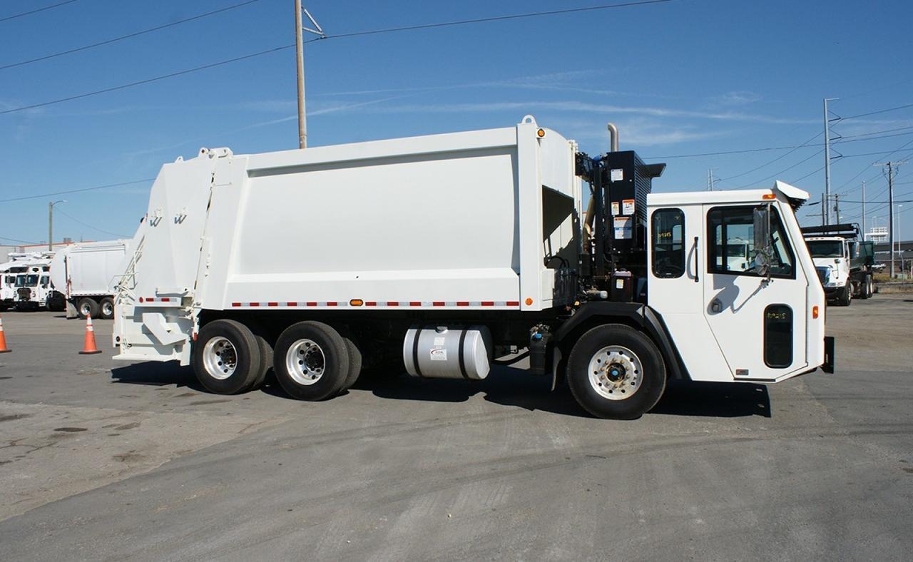 2025 Battle Motors LET 2 25 Yard Heil Rear Loader Garbage Truck