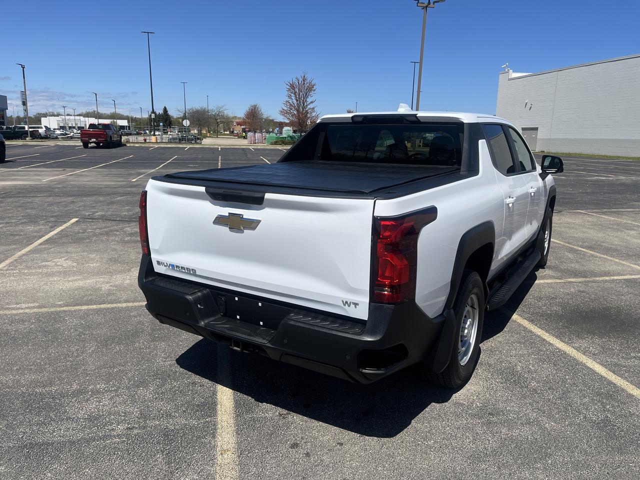 2025 Chevrolet Silverado EV Work Truck Max Range e4WD w/Dual-LevelChargeCord Spray-OnBedliner SoftRollUpTonneauCover AssistSteps Saukville WI