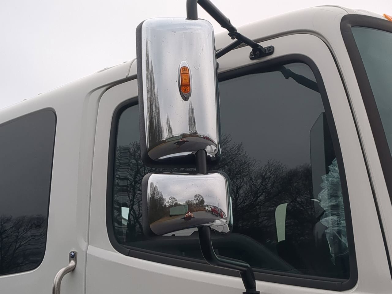 2025 Hino L6 Extended Cab equipped with Chevron 21.5ft LCG Rollback Body Winder GA