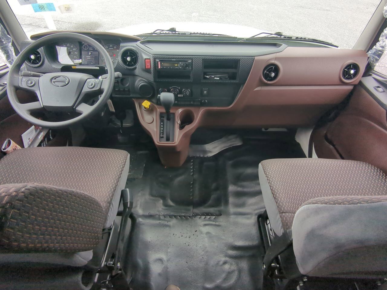 2025 Hino L6 Extended Cab equipped with Chevron 21.5ft LCG Rollback Body Winder GA