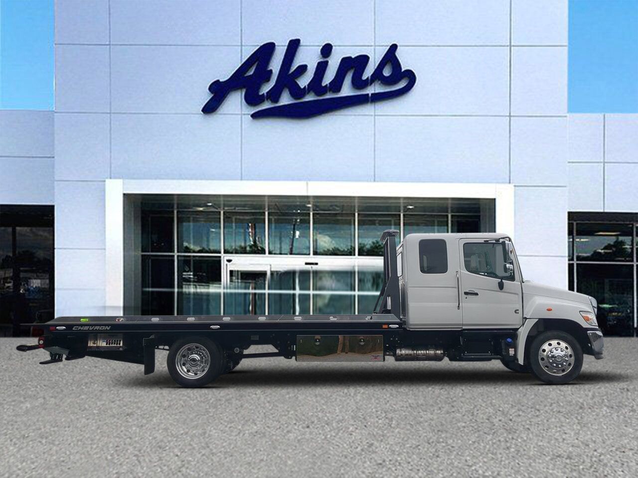 2025 Hino L6 Extended Cab equipped with Chevron 21.5ft LCG Rollback Body